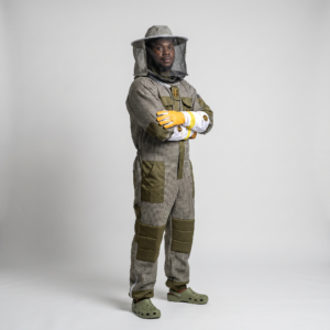 Olive suit man hat veil arms crossed fullbody studio